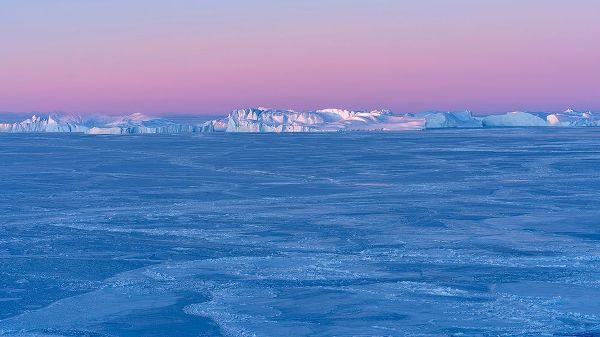 Sunrise during winter at the Ilulissat Fjord-located in the Disko Bay in West Greenland